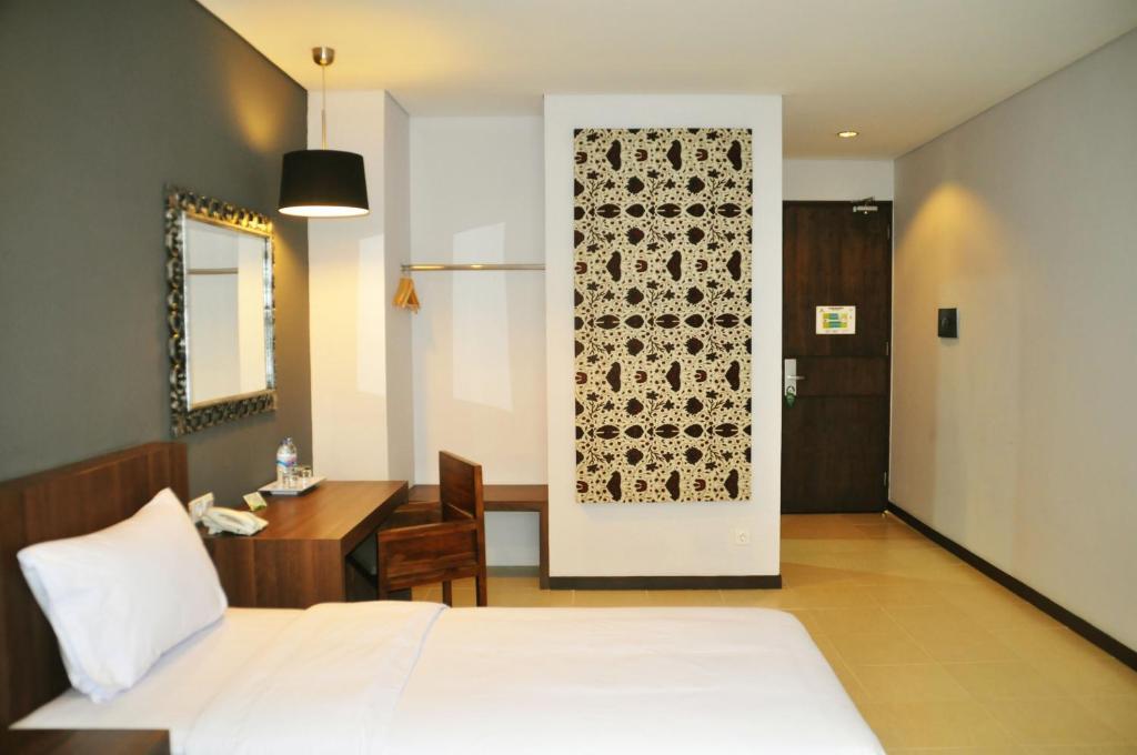 Praja Hotel Денпасар Номер фото